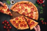 picking-slice-of-pepperoni-pizza-picture-id1133727757